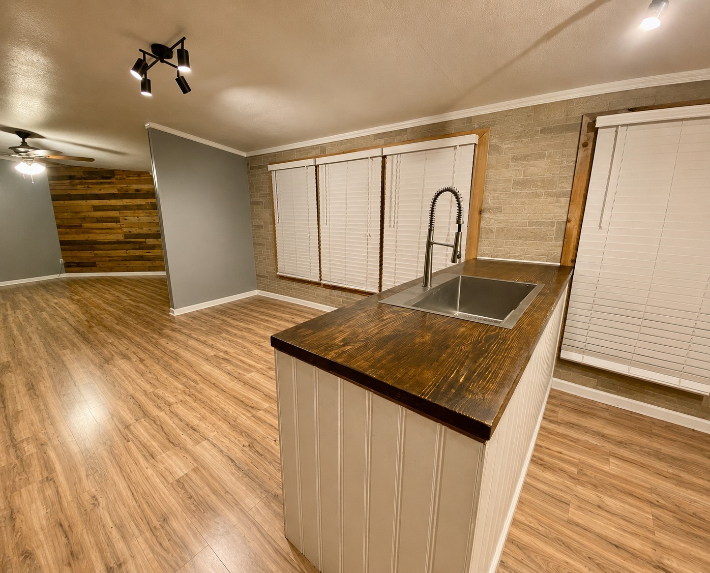 27125 Riley Road Waller, TX 77484 - Photo 7 of 25 View of island with sink, breakfast area and back living area