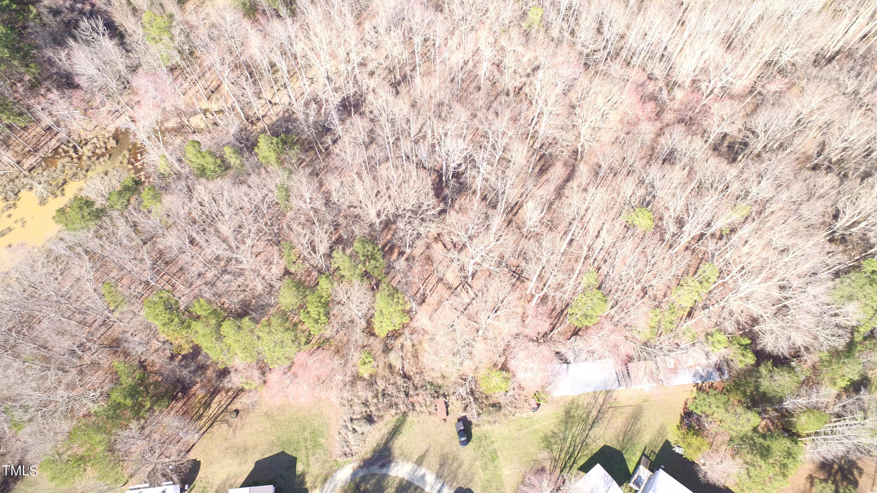 0 Pepper Pot Place Roxboro, NC 27574 - Photo 2 of 3 a backyard of a house