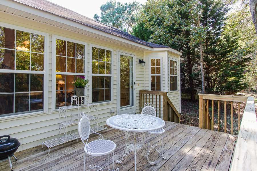 209 South Ridge Drive Garner, NC 27529 - Photo 5 of 23 Perfect spot for morning coffee, afternoon tea, anytime relaxation! Exterior Back