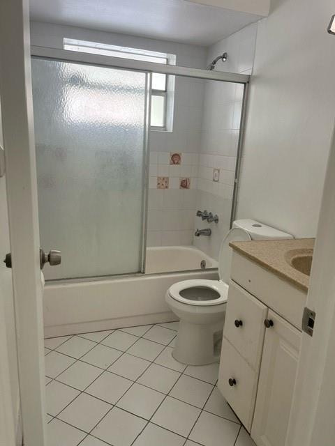 4169 Southwest 67th Avenue, Unit 209A Davie, FL 33314 - Photo 13 of 18 a bathroom with a toilet a sink and shower