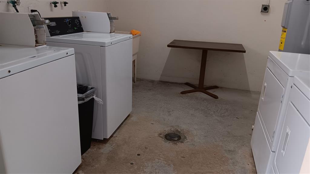 4169 Southwest 67th Avenue, Unit 209A Davie, FL 33314 - Photo 18 of 18 a utility room with dryer and washer