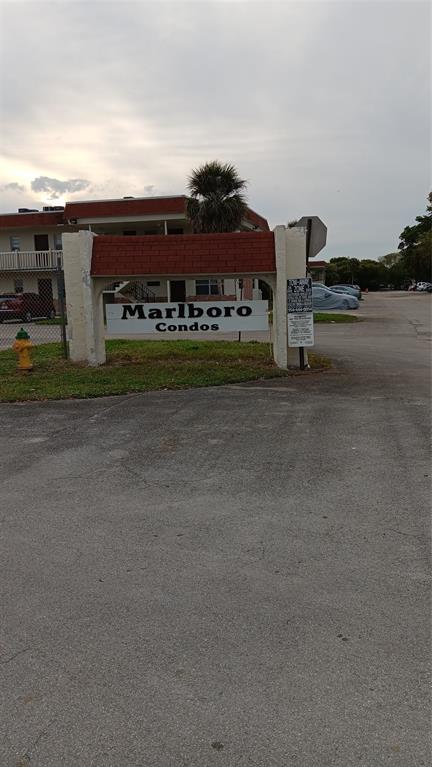 4169 Southwest 67th Avenue, Unit 209A Davie, FL 33314 - Photo 2 of 18 a view of street with view of building