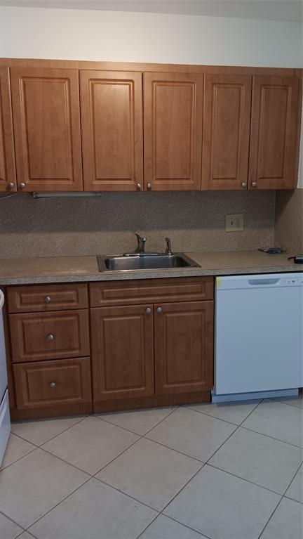 4169 Southwest 67th Avenue, Unit 209A Davie, FL 33314 - Photo 8 of 18 a kitchen with a sink and cabinets