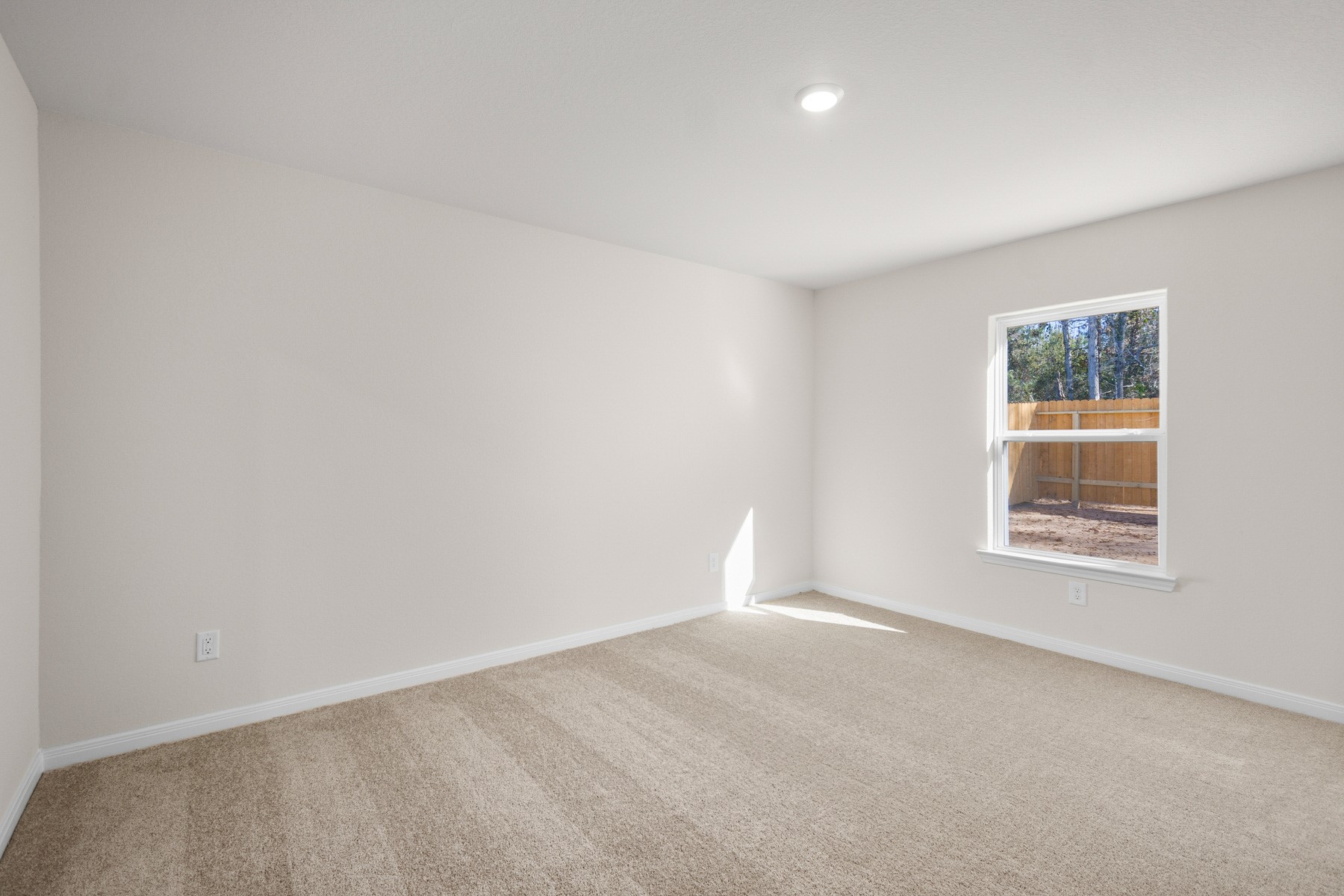 345 Fastboy Lane Waller, TX 77484 - Photo 12 of 21 an empty room with a window