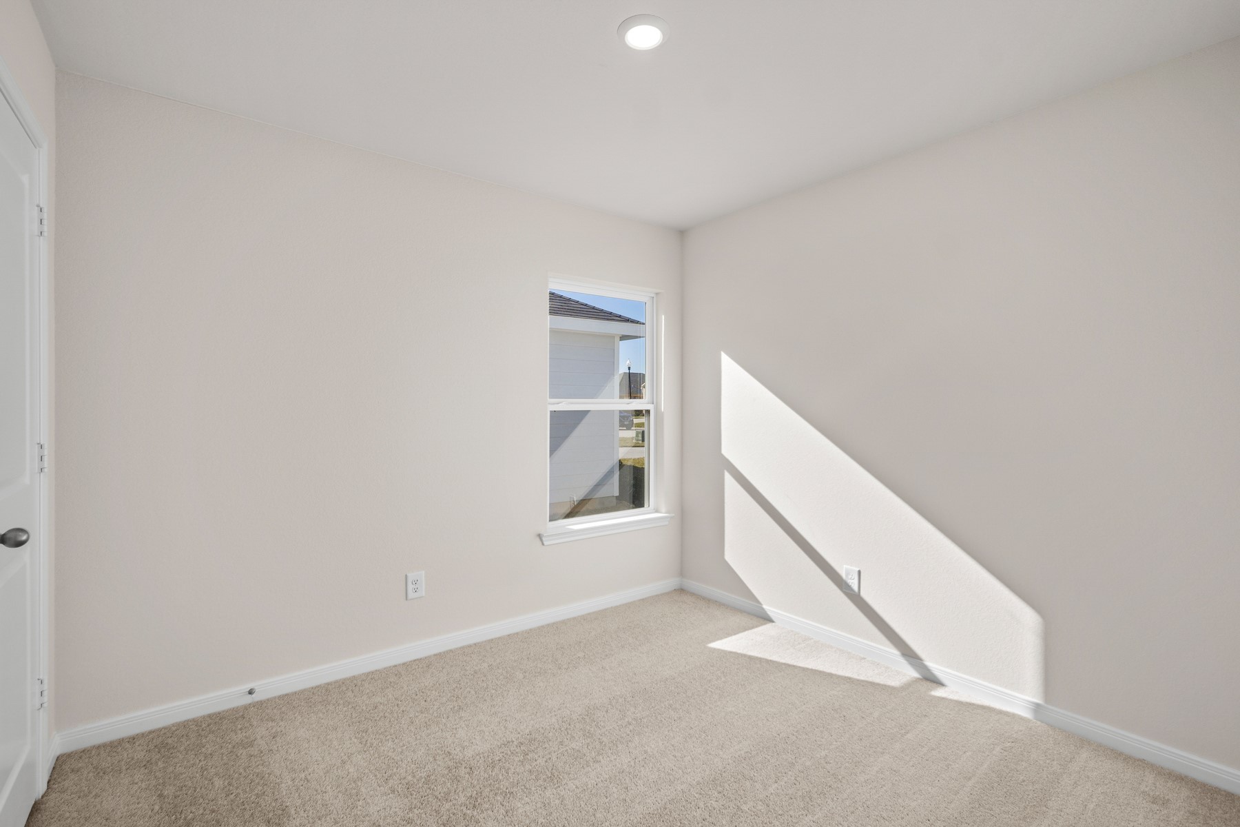345 Fastboy Lane Waller, TX 77484 - Photo 18 of 21 a view of an empty room with windows
