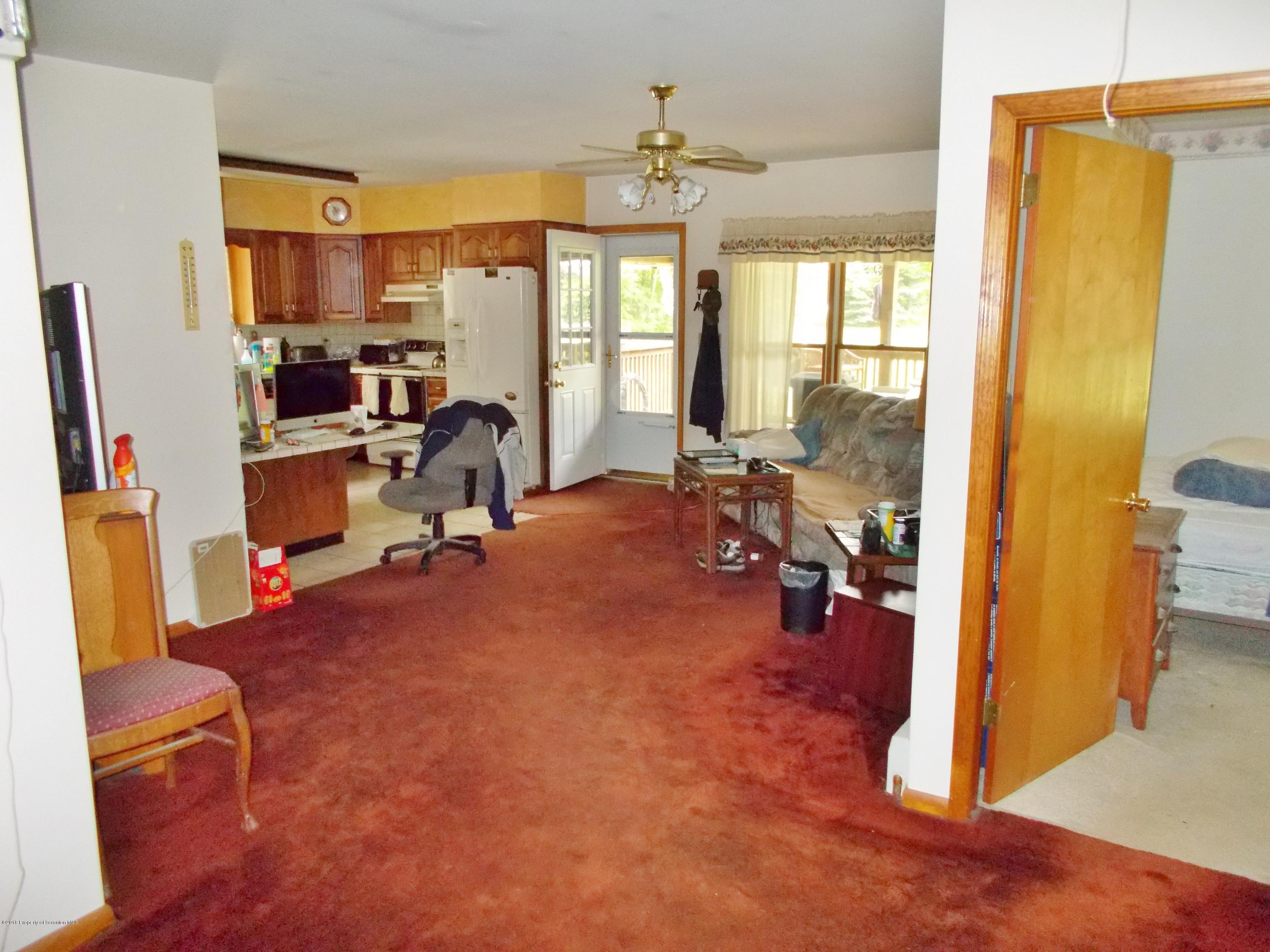 577 Pa-rt690 Road Moscow, PA 18444 - Photo 5 of 16 a view of a room with gym equipment