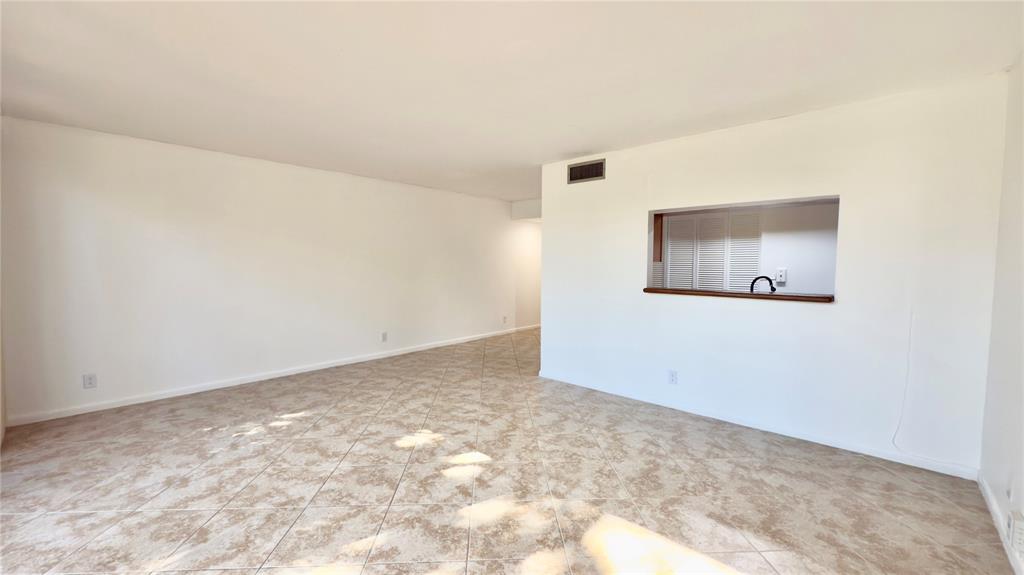 2941 Southwest 87th Avenue, Unit 403 Davie, FL 33328 - Photo 14 of 24 an empty room with windows