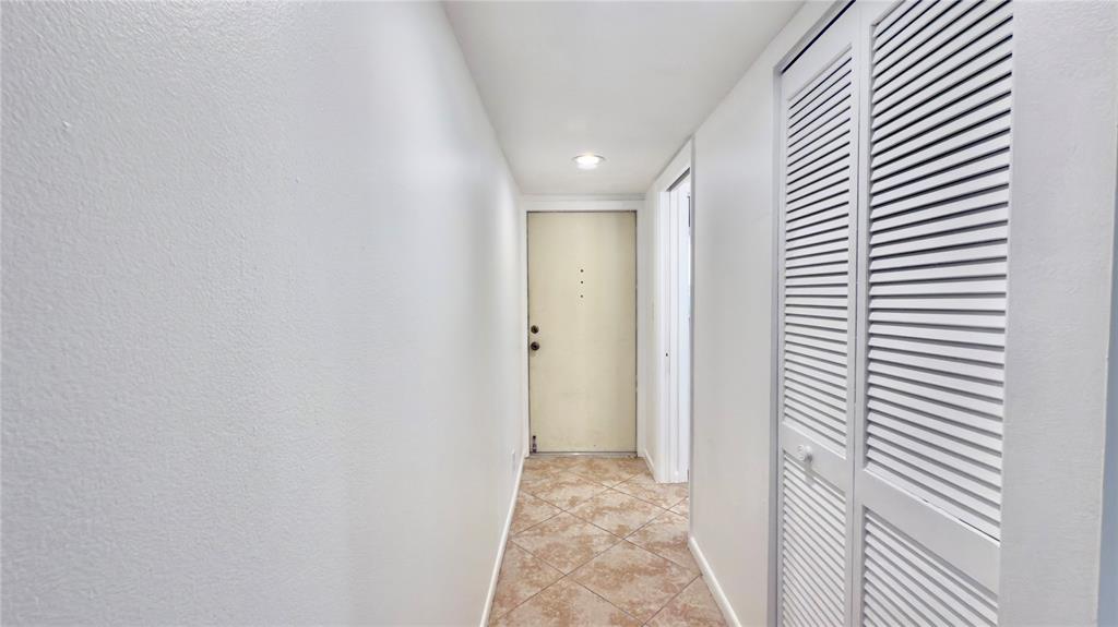 2941 Southwest 87th Avenue, Unit 403 Davie, FL 33328 - Photo 2 of 24 a view of a hallway