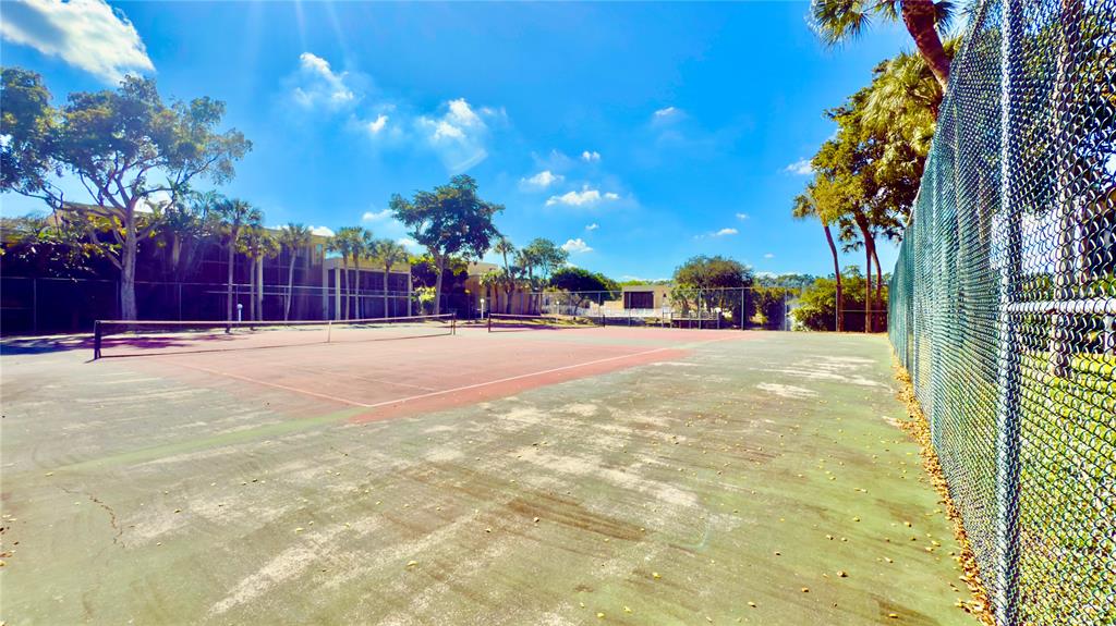 2941 Southwest 87th Avenue, Unit 403 Davie, FL 33328 - Photo 23 of 24 a view of road and trees