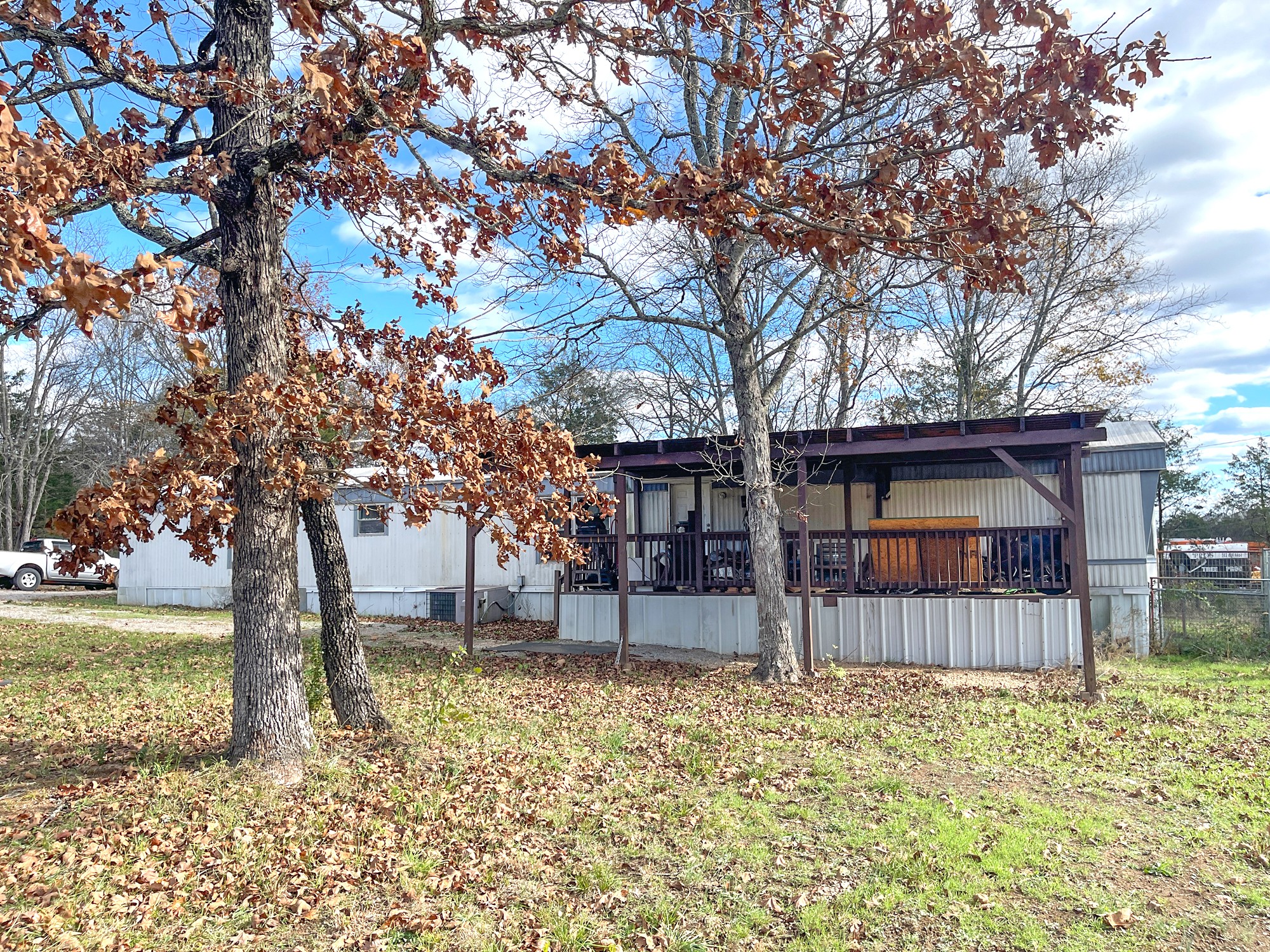 440 Baxter Road Murfreesboro, TN 37130 - Photo 2 of 7 a house with trees in front of it