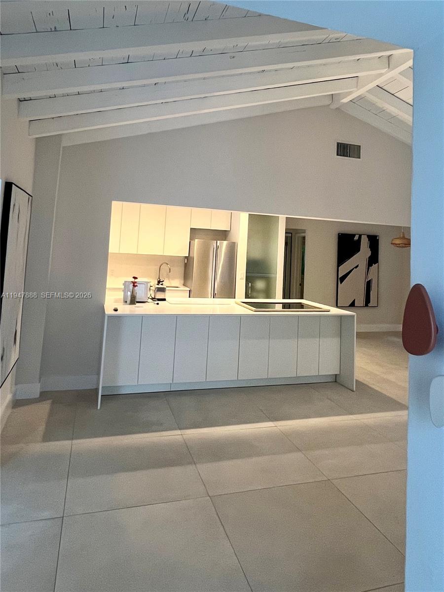 337 Southwest 23rd Road Miami, FL 33129 - Photo 11 of 30 a view of a kitchen with an empty room