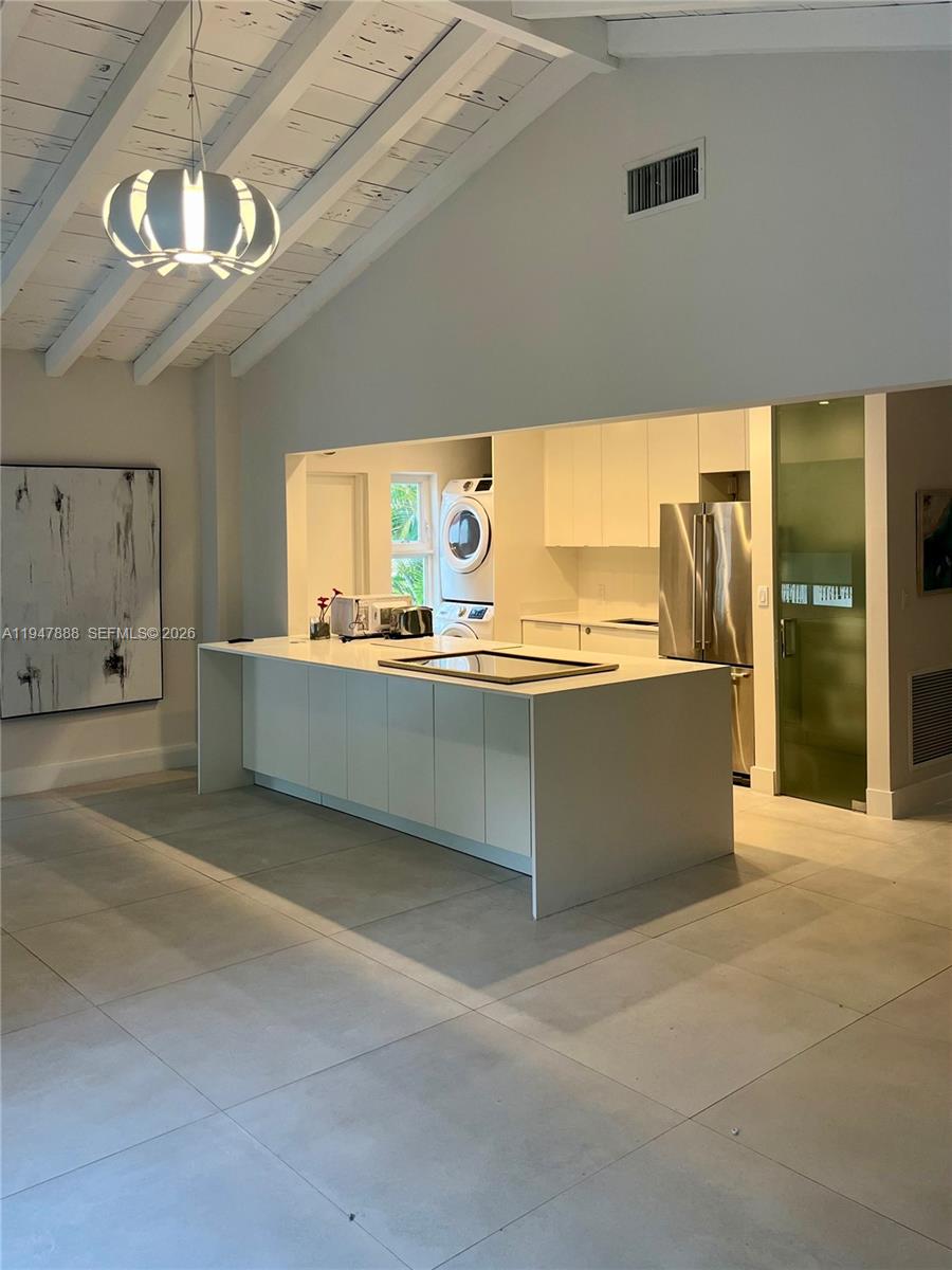 337 Southwest 23rd Road Miami, FL 33129 - Photo 12 of 30 a view of a kitchen with a sink and cabinets