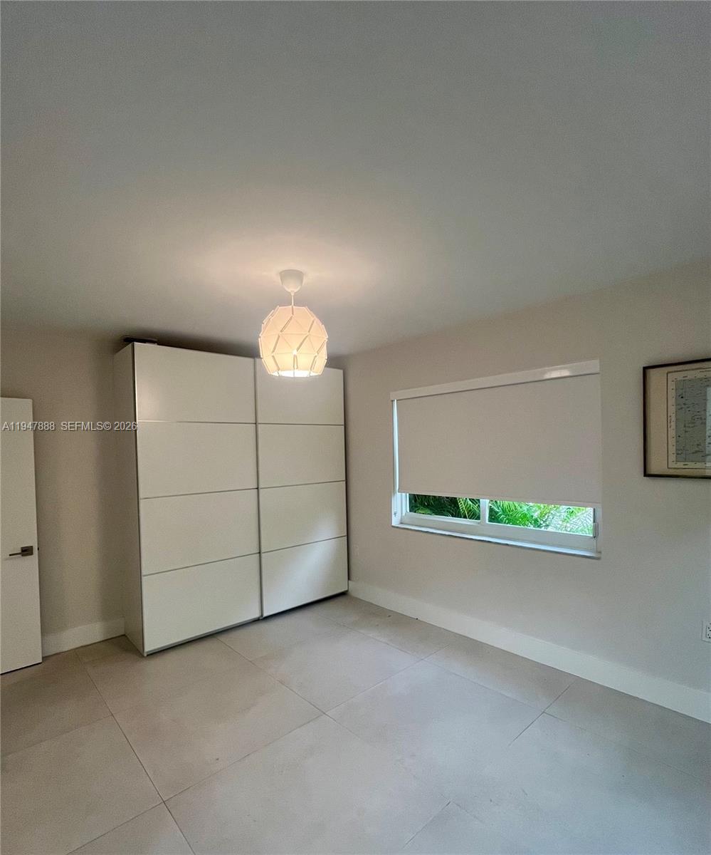 337 Southwest 23rd Road Miami, FL 33129 - Photo 20 of 30 an empty room with windows and entrance