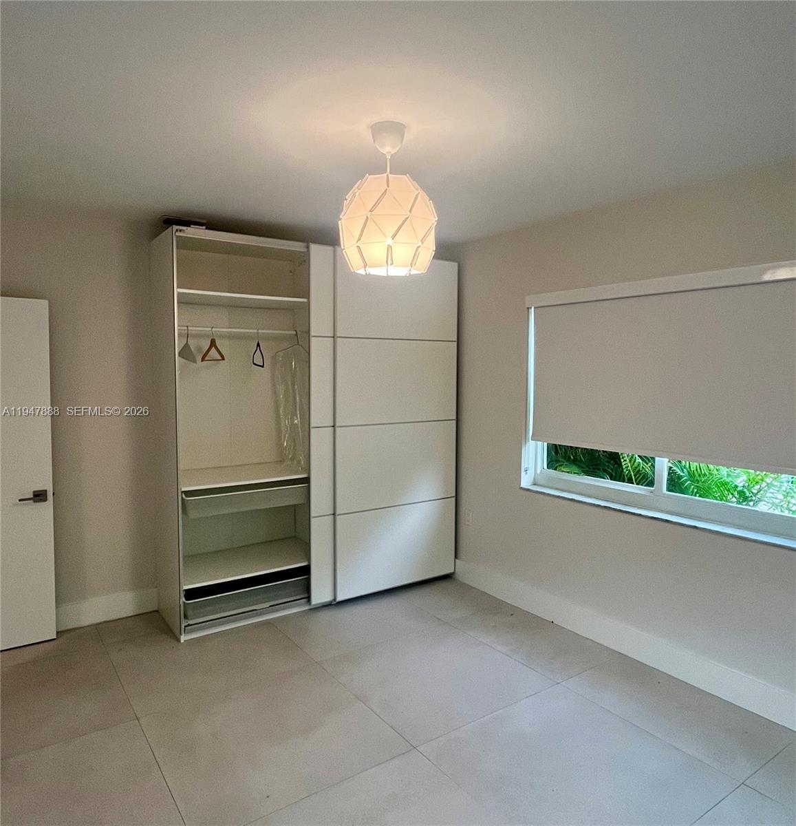 337 Southwest 23rd Road Miami, FL 33129 - Photo 22 of 30 a view of an empty room with a window