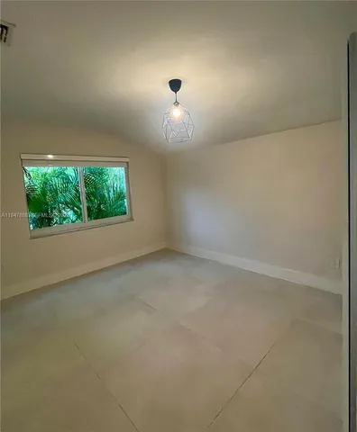 a view of a room with a hallway