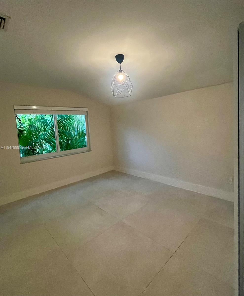 337 Southwest 23rd Road Miami, FL 33129 - Photo 23 of 30 a view of empty room with window