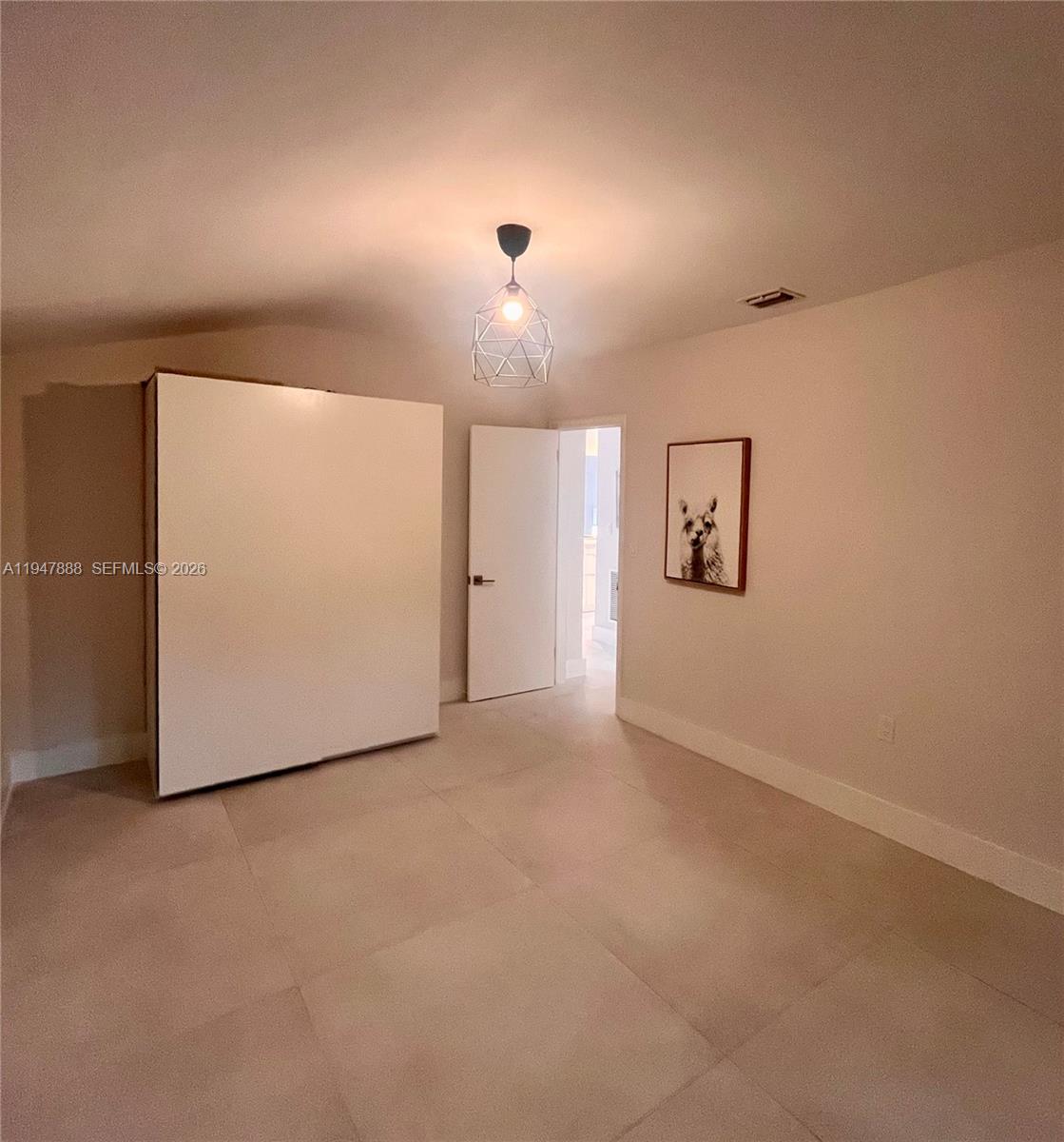 337 Southwest 23rd Road Miami, FL 33129 - Photo 24 of 30 a view of a room with a hallway