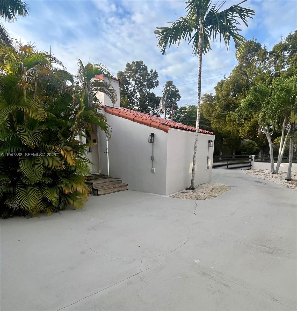 337 Southwest 23rd Road Miami, FL 33129 - Photo 26 of 30 a backyard of a house with palm trees