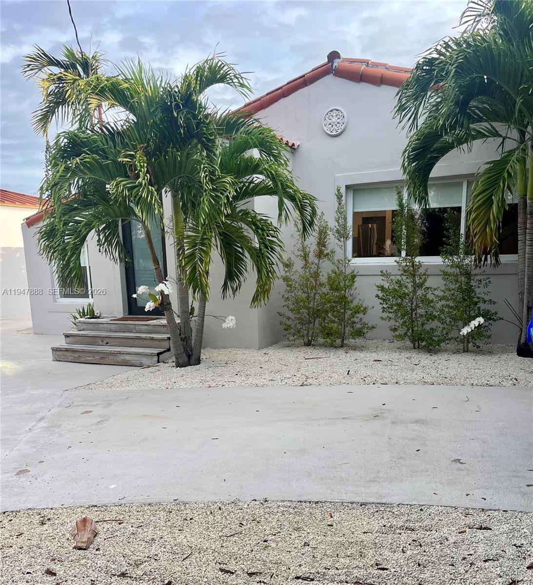 337 Southwest 23rd Road Miami, FL 33129 - Photo 27 of 30 a view of a house with a palm tree