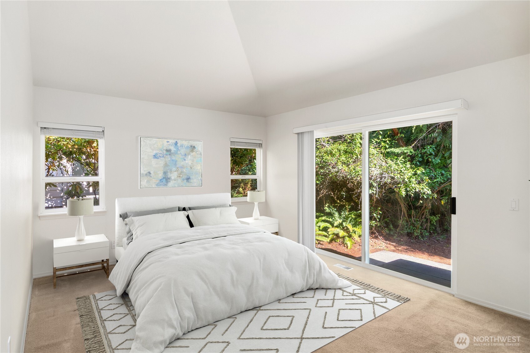 61 South Keel Way Port Ludlow, WA 98365 - Photo 12 of 33 a bedroom with a large bed and a window