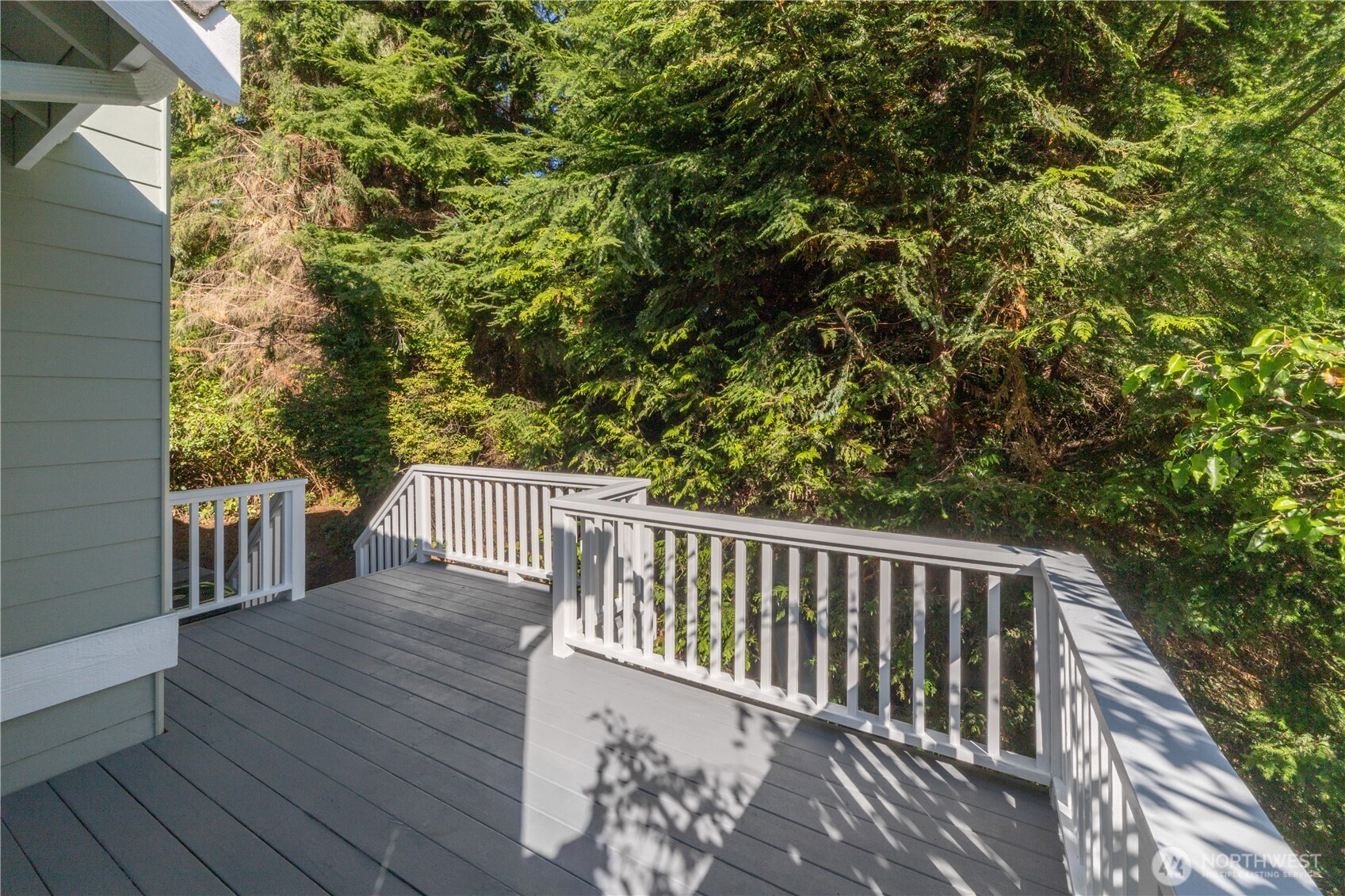 61 South Keel Way Port Ludlow, WA 98365 - Photo 26 of 33 a balcony with wooden floor and fence