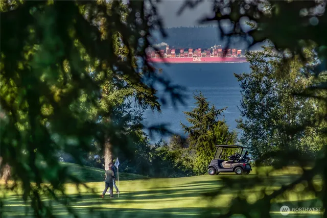 a sign that is sitting in the middle of a forest