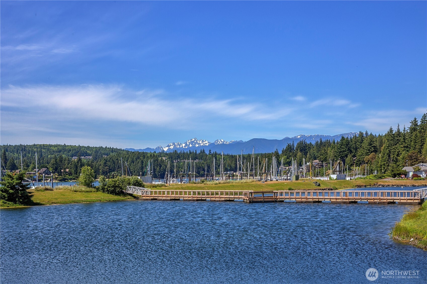 61 South Keel Way Port Ludlow, WA 98365 - Photo 29 of 33 a view of a swimming pool with a yard and lake view