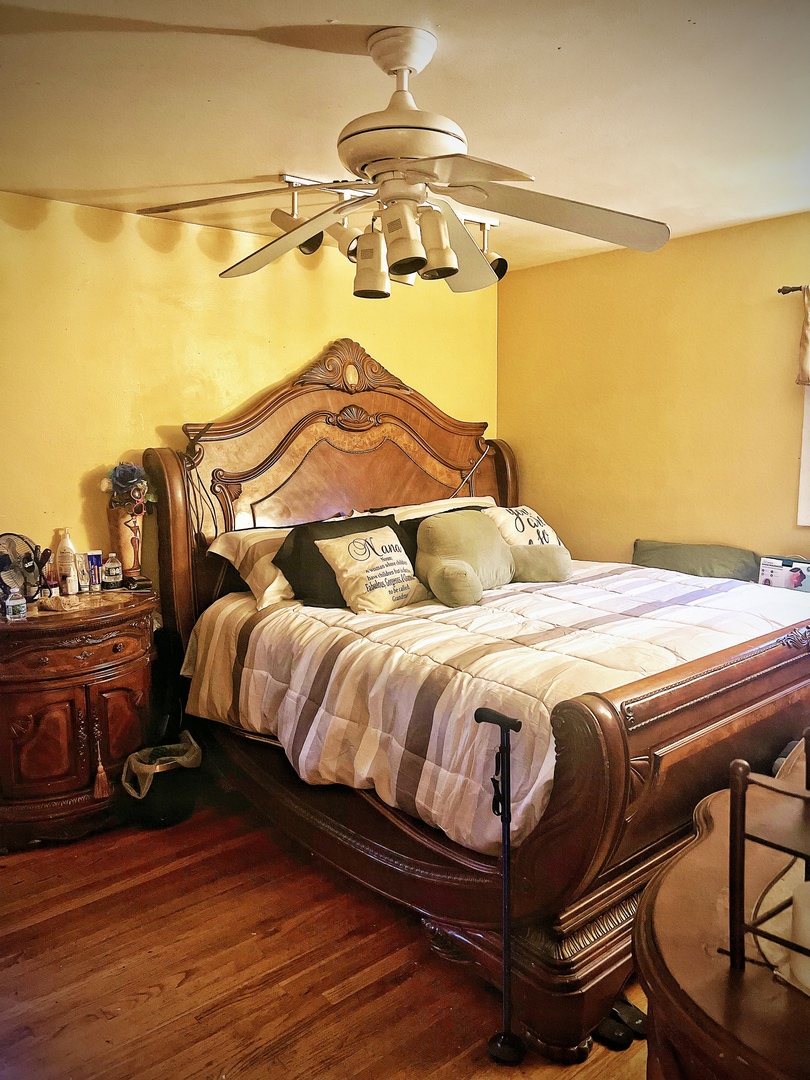 910 Bowling Green Drive Homewood, IL 60430 - Photo 8 of 14 a bedroom with a bed and wooden floor