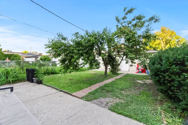 a view of swings and flowers