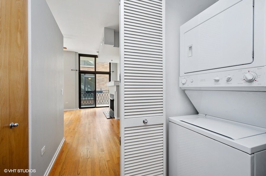 1201 West Adams Street, Unit 609 Chicago, IL 60607 - Photo 11 of 13 a utility room with dryer and washer