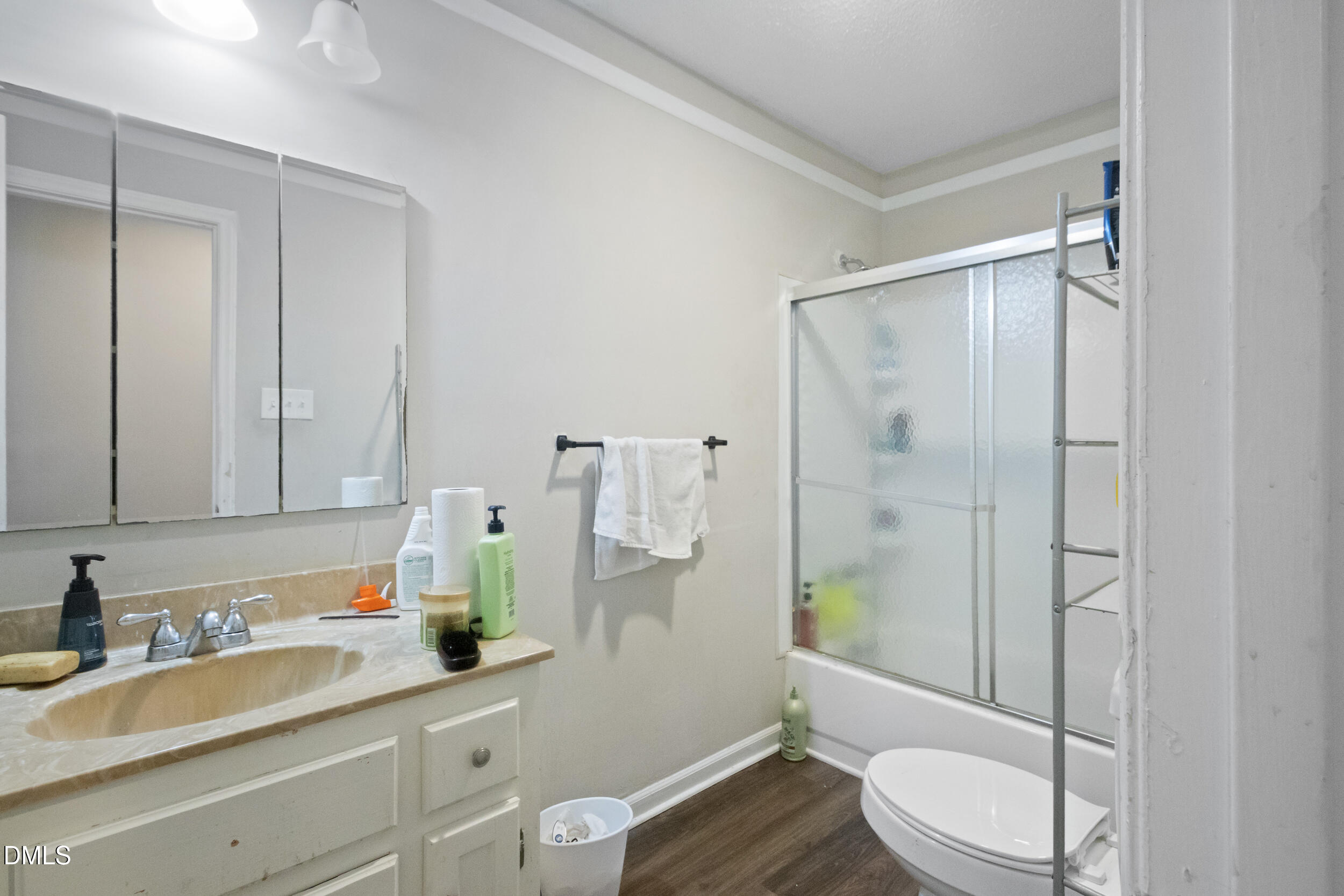 2930 Thomas Road Henderson, NC 27537 - Photo 9 of 17 a bathroom with a granite countertop sink toilet and shower