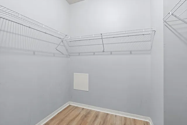 a view of a room with racks on the wall