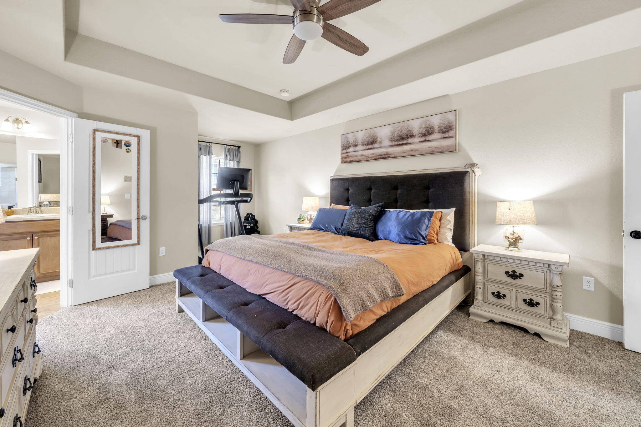 217 Raptor Drive Crestview, FL 32536 - Photo 25 of 48 a bedroom with a bed and a chandelier