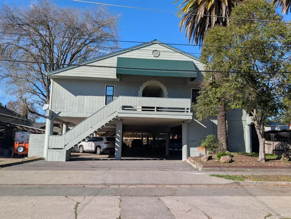a front view of a house with a garage