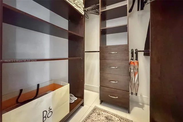 a bathroom with a tub and a shower