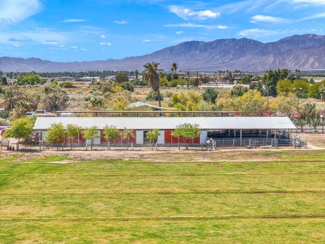 a view of a swimming pool with an ocean view