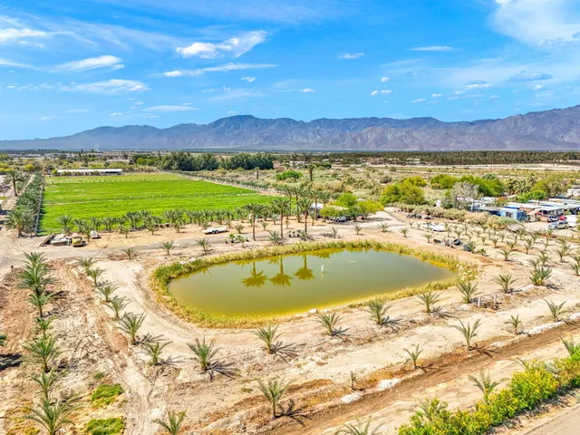 a view of a swimming pool with an ocean view
