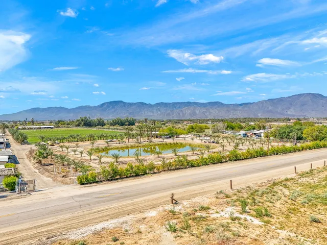 a view of an ocean and a mountain