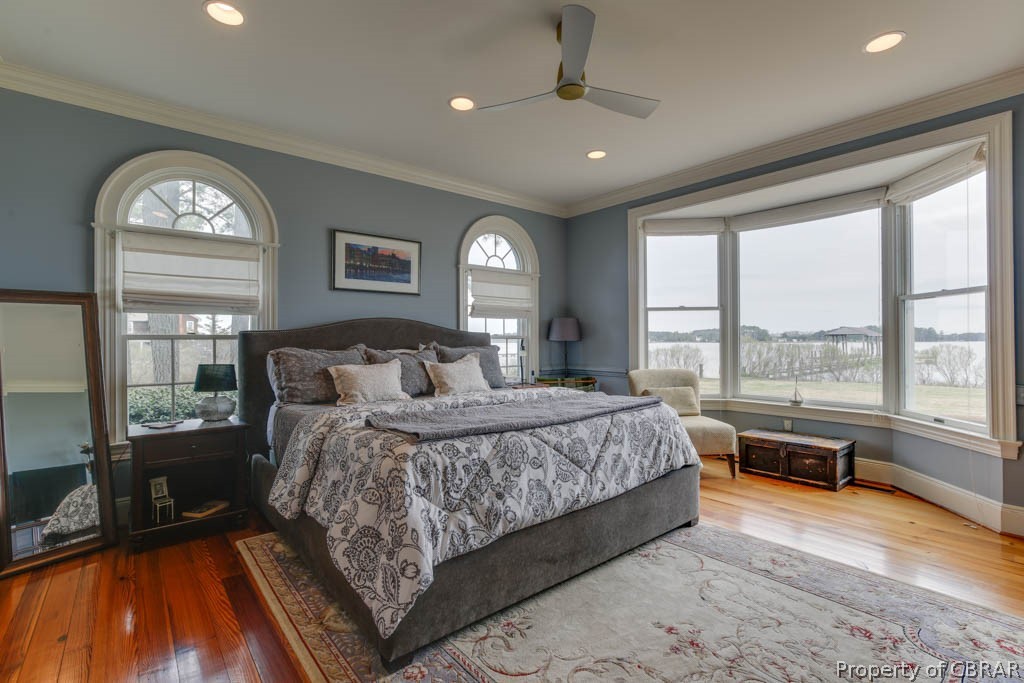 3459 Stonewall Road Hayes, VA 23072 - Photo 26 of 50 This primary bedroom suite offered amazing river views. What a wonderful way to wake up in the morning!