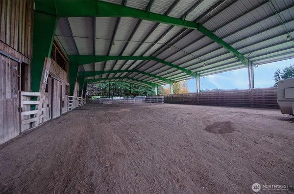 a view of a room with wooden walls