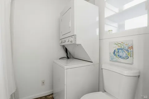 a view of a backyard with large trees