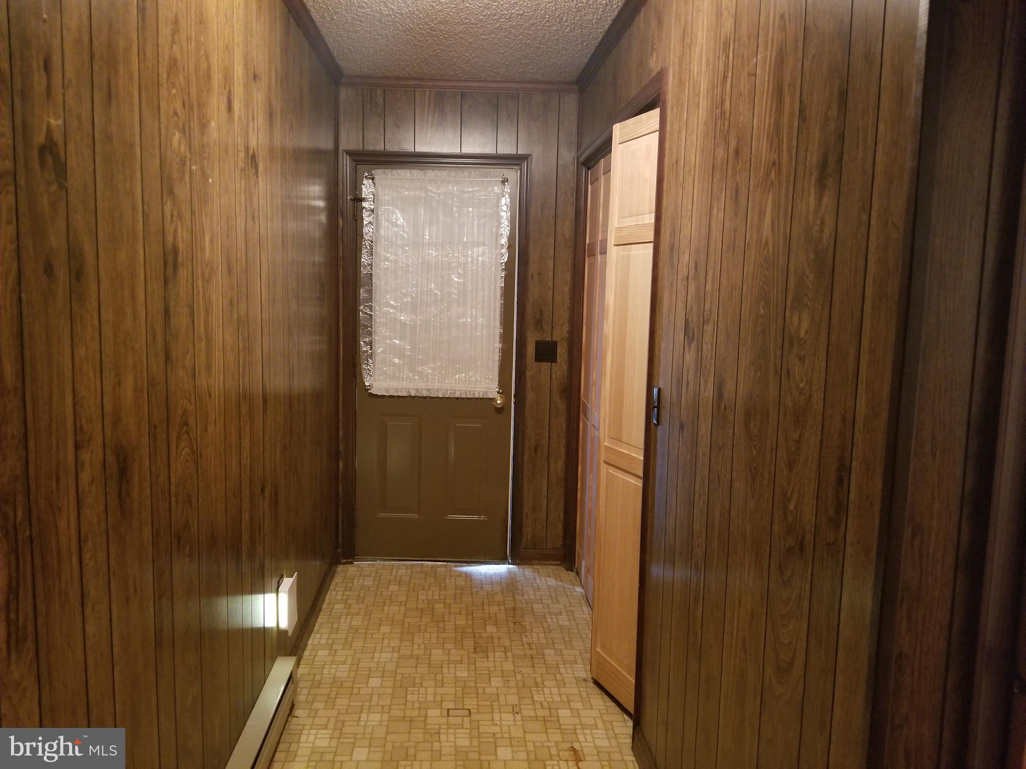 7230 Hubbard Road Federalsburg, MD 21632 - Photo 11 of 16 Rear Hall And Door