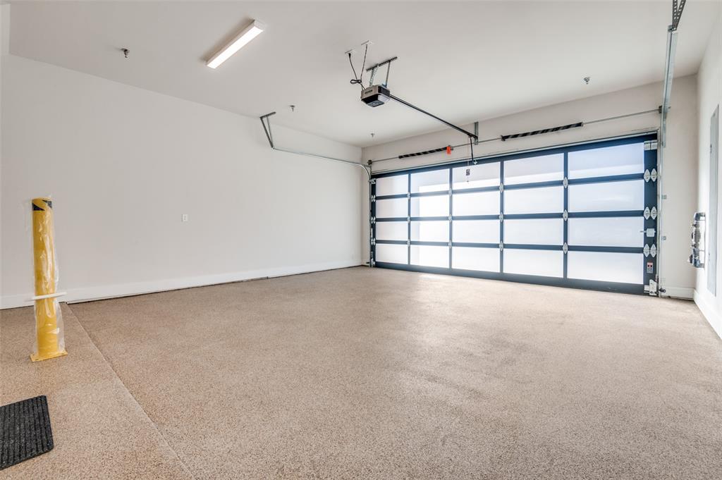 218 East Dallas Road, Unit 102 Grapevine, TX 76051 - Photo 27 of 33 a view of an empty room with a window