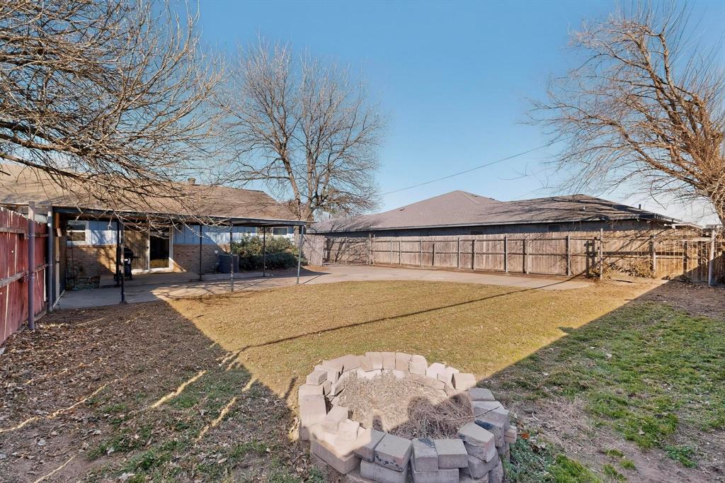 153 Sheri Lane Hurst, TX 76053 - Photo 16 of 16 153 Side - Yard