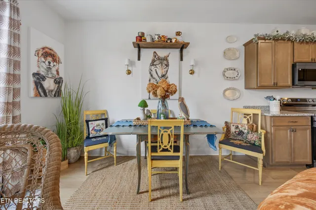 a bed room with furniture and a chandelier
