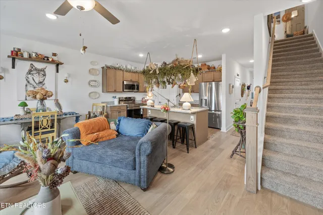 a room with a chandelier furniture and a chandelier