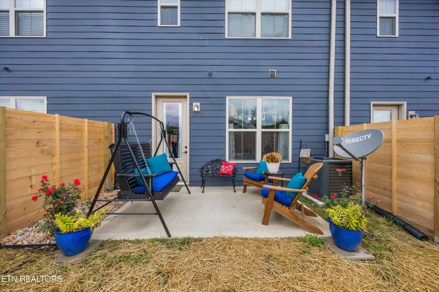 a aerial view of a house with a yard