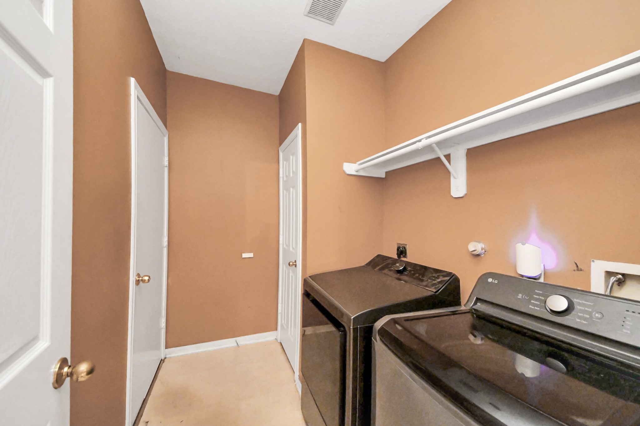23814 Spring Dane Drive Spring, TX 77373 - Photo 23 of 41 a utility room with dryer and washer