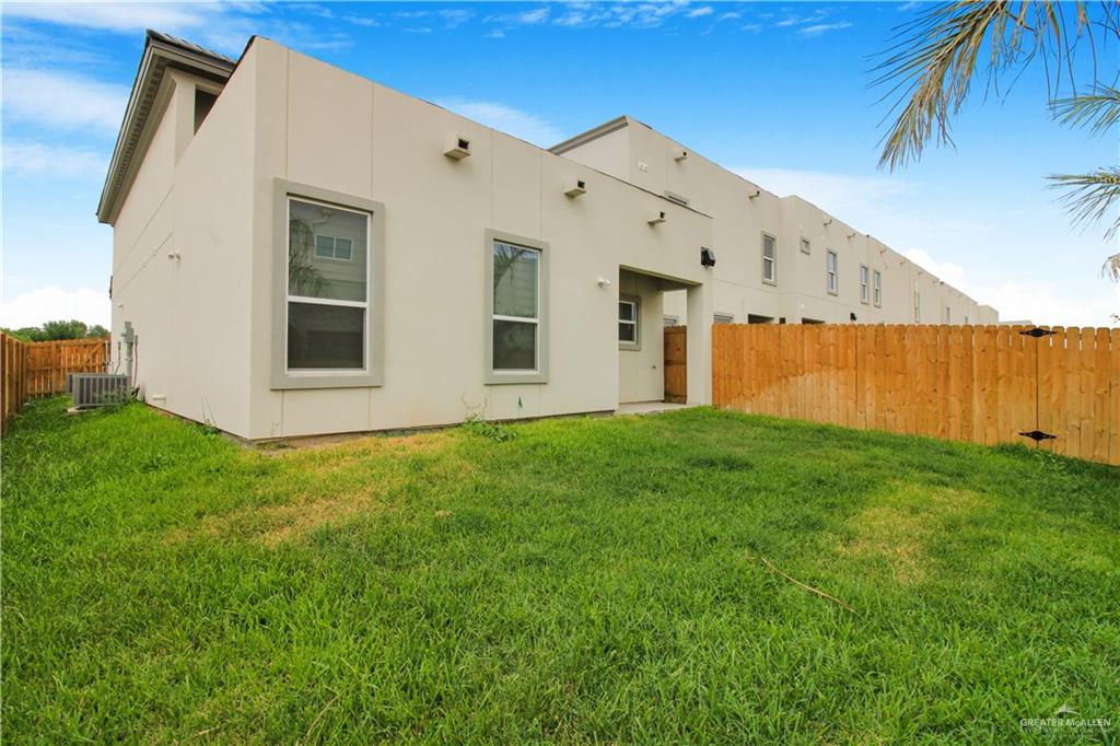 2202 Corales Street Mission, TX 78573 - Photo 14 of 18 very good size backyard as this is the end unit