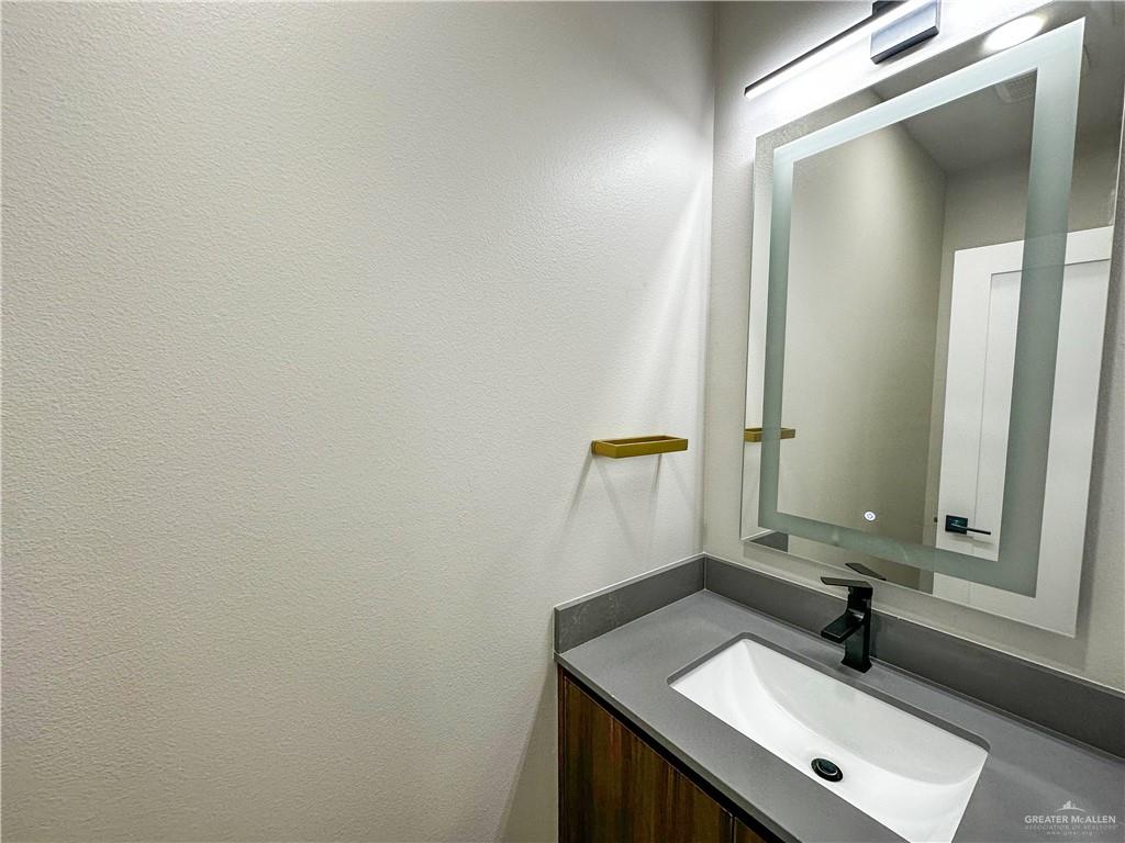 2202 Corales Street Mission, TX 78573 - Photo 4 of 18 Bathroom featuring vanity with lighting inthe back